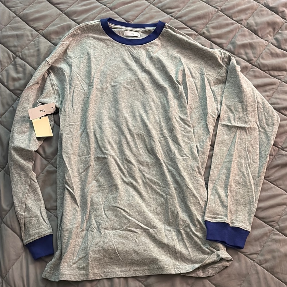 TNA long sleeve tshirt with blue accents
